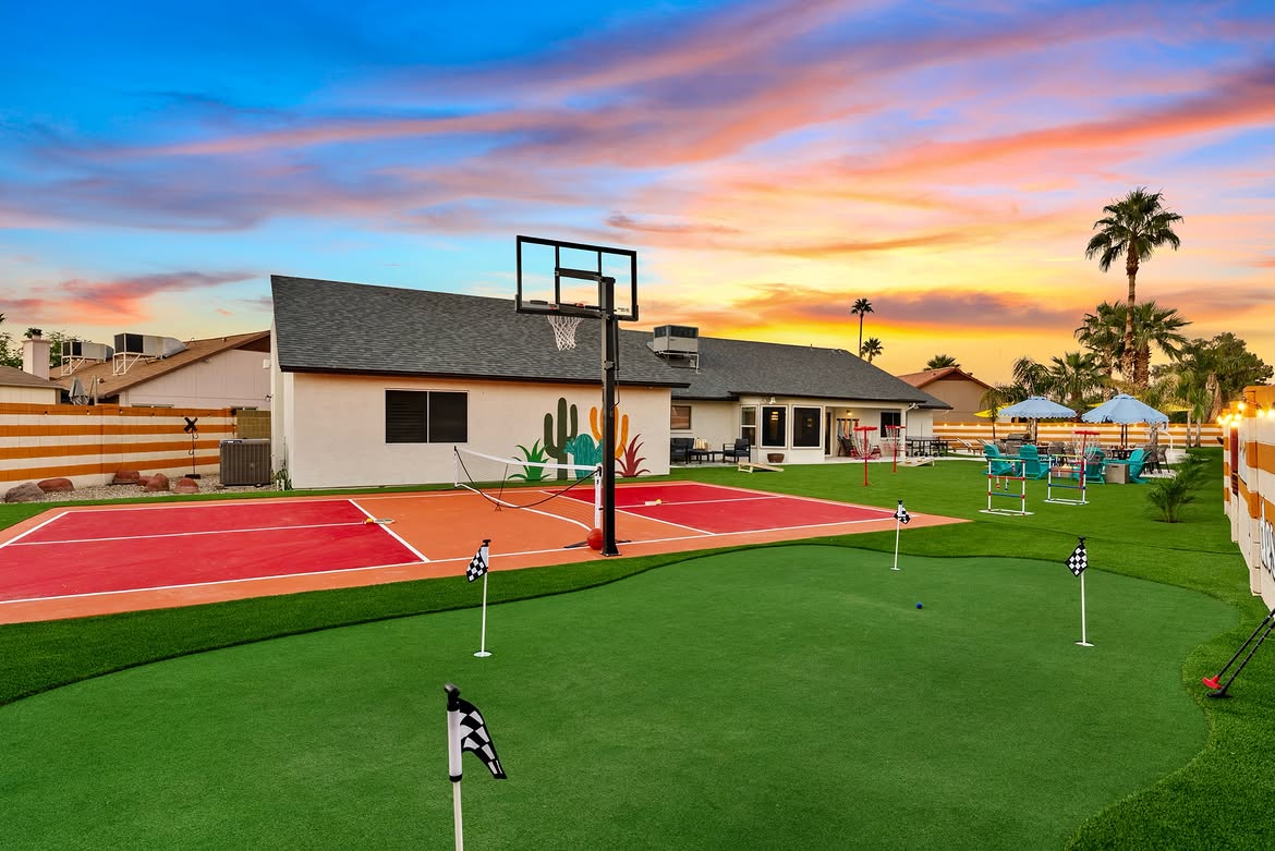 Jardín con putting green y juegos